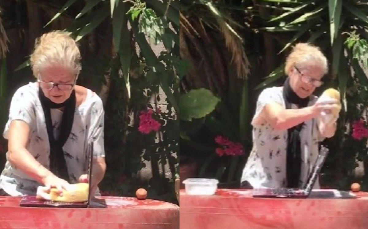 Joven capta a su abuelita lavando su laptop con agua y jabón: «Ahí tenía mi tesis»