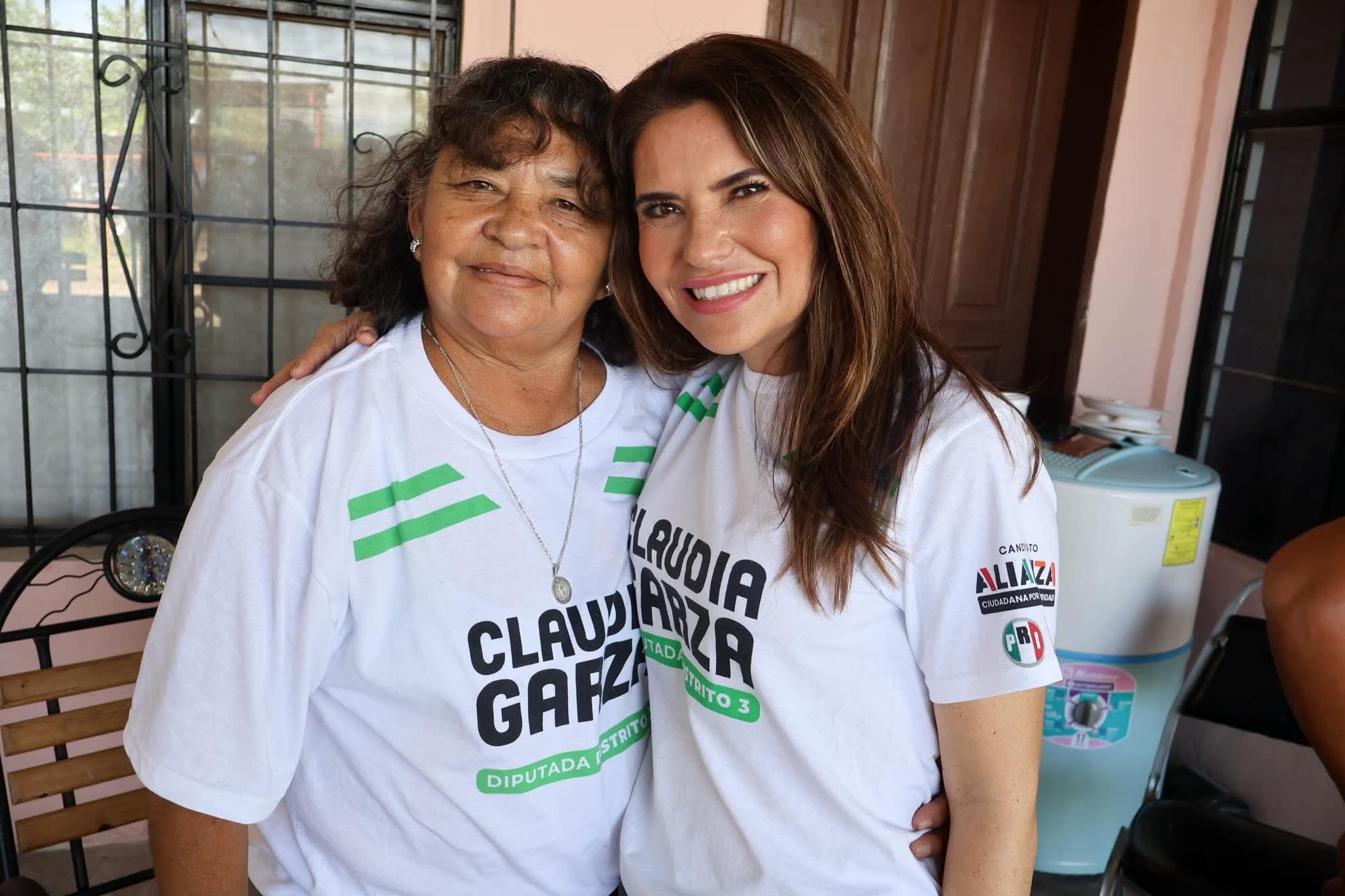 Escobedo con Claudia Garza