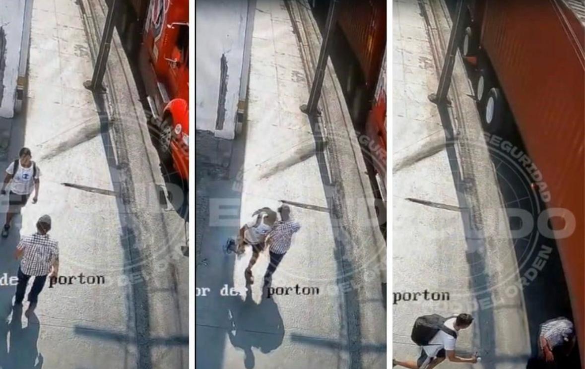 Joven empuja a hombre que murió atropellado por tráiler